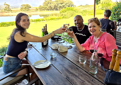 People enjoying a dining experience at a restaurant during a Cape Town tour